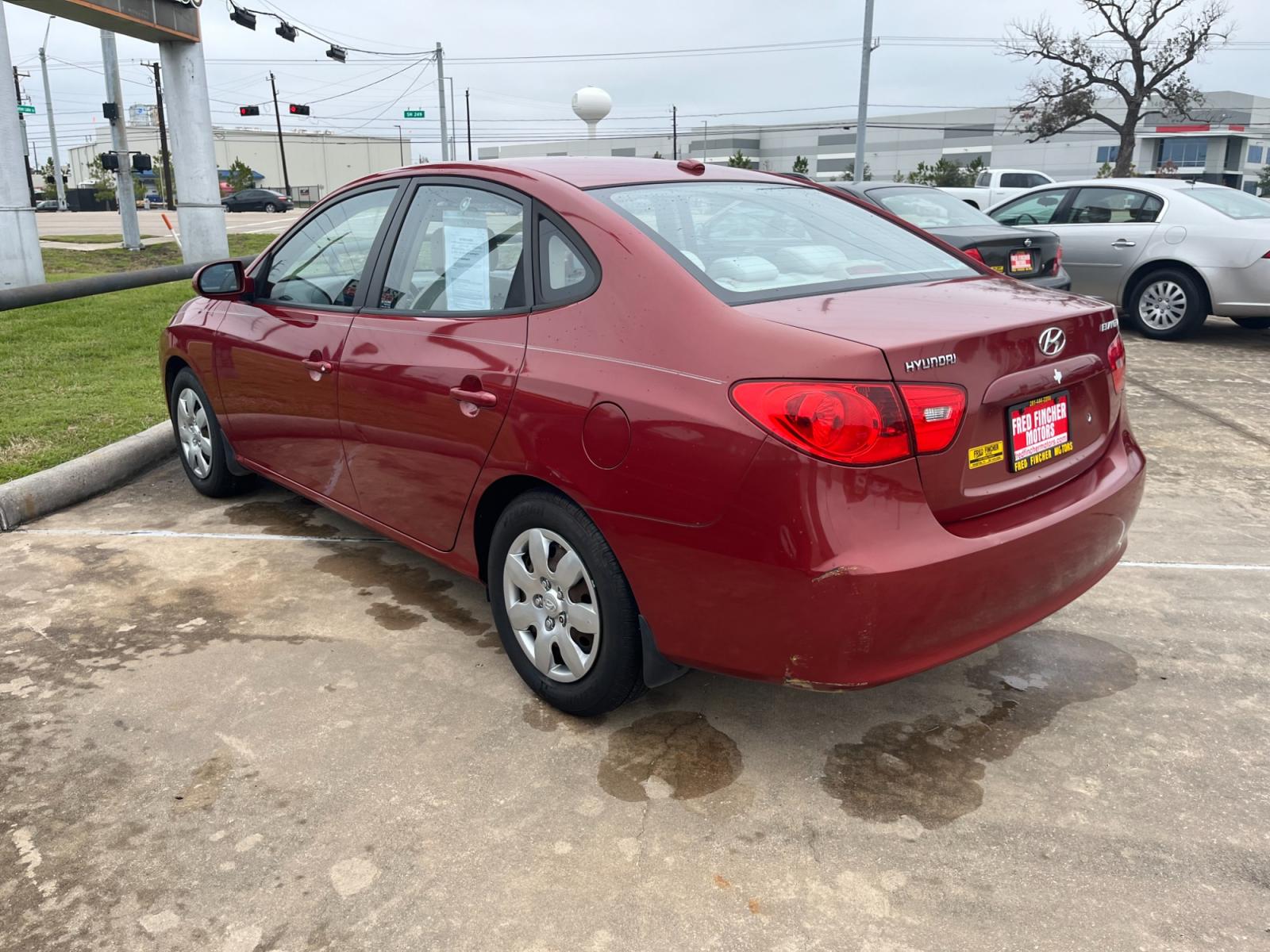 2008 red /TAN Hyundai Elantra GLS (KMHDU46D78U) with an 2.0L L4 DOHC 16V engine, Manual transmission, located at 14700 Tomball Parkway 249, Houston, TX, 77086, (281) 444-2200, 29.928619, -95.504074 - Photo #4